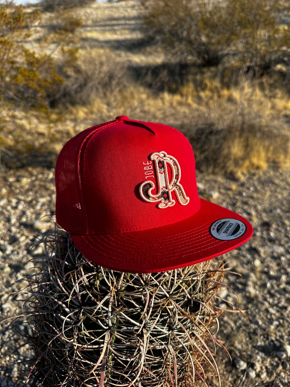 CREAM AZTEC RED CAP